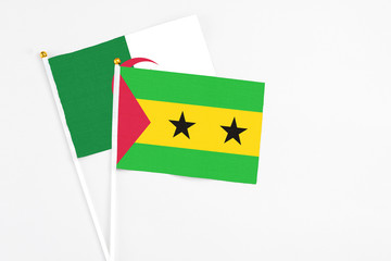 Sao Tome And Principe and Algeria stick flags on white background. High quality fabric, miniature...