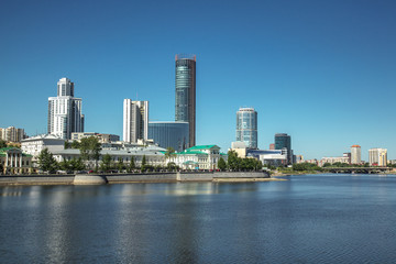 Yekaterinburg city center skyline and Iset river. Ekaterinburg is the fourth largest city in Russia and the centre of Sverdlovsk Oblast. Summer day.