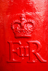 Vintage red British public postbox in full frame close-up for romantic holiday snail mail