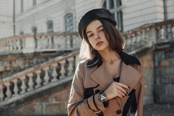 Outdoor close up autumn portrait of young elegant confident model, woman wearing trendy faux...