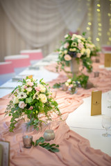 wedding table with flowers and decorations, wedding centerpiece or event reception 