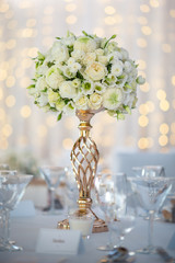 wedding table with flowers and decorations, wedding centerpiece or event reception 