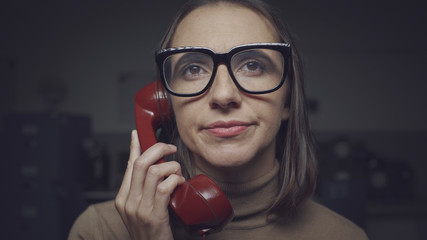 Woman having a boring phone call