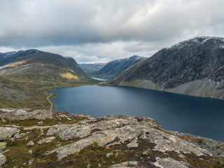 View of the Lake Djupvatnet from raod to mountain Dalsnibba plateaua. Norway, early autumn, cloudy day. Travel Holiday in Norway