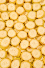 Fresh banana slices background. Top view.