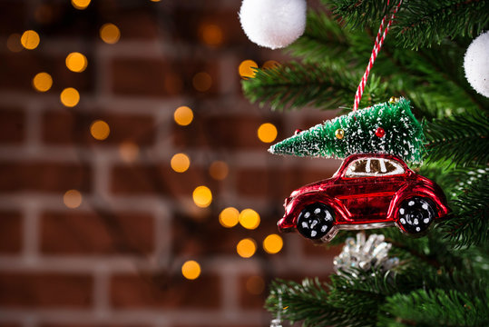 Christmas tree toy in shape of red car