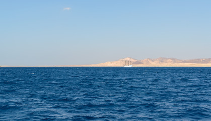 Obraz premium Sharm el Sheikh is a resort city in Egypt at the southern tip of the Sinai Peninsula on the Red Sea coast of the Egyptian Riviera. Boat trip to the coral reefs of Tiran island.