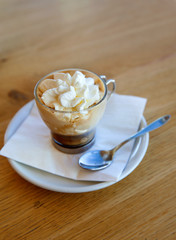 coffee with cream on the table in  cafe