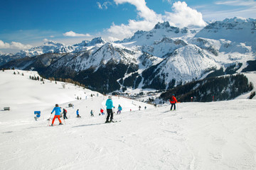 Fototapeta na wymiar Skiers on the track in the winter mountains