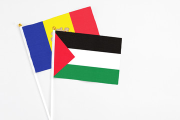 Palestine and Andorra stick flags on white background. High quality fabric, miniature national...