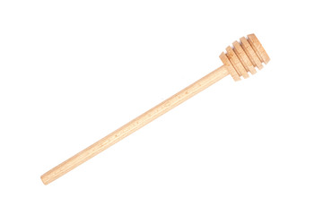 Wooden honey stick isolated on the white background.