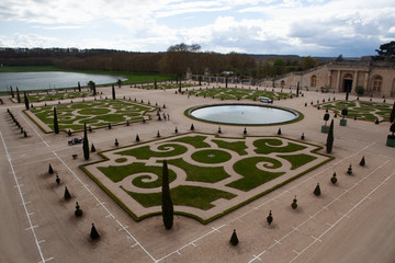 High angle view of plants amidst footpath at Versailles Orangerie against sky