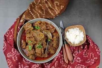 Overhead view of Indian  Goat curry, Mutton curry, Nihari, Rogan Josh in a bowl .