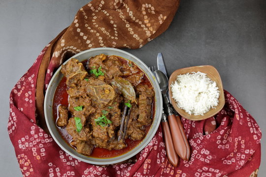 Overhead view of Indian  Goat curry, Mutton curry, Nihari, Rogan Josh in a bowl .