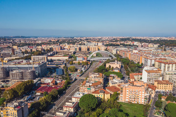 Aerial view of Rome Italy residential areas with houses, flight on drone above city buildings in sunny day.
