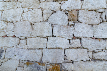 Stone wall, old white stones background