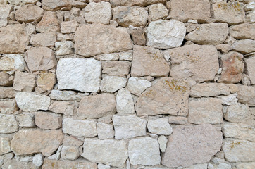 Stone wall, old white stones background