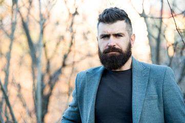 Fine grooming for modern savage. Bearded man with brutal beard. Hipster wear long beard and...