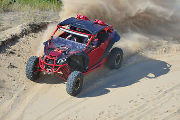 Summer UTV, ATV & offroad driving in sand dune. Extreme, adrenalin. 4x4.