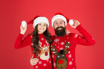 Bearded man and kid. Happy family celebrate holiday. Happy new year. Waiting santa claus. Happy together. Merry christmas. Dad and daughter winter sweaters celebrate new year. Winter holidays