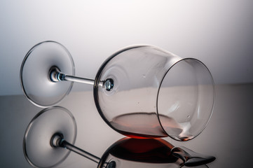  thrown glass of red wine and wine drops