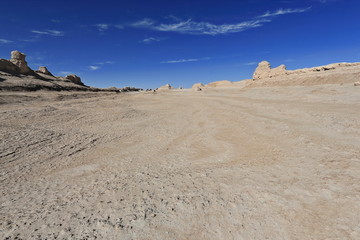 Cirrus uncinus-mares.tails clouds over yardangs-wind eroded rock surfaces. Qaidam desert-Qinghai-China-0588