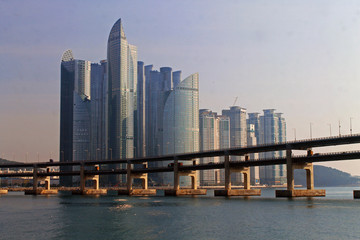 Fototapeta na wymiar Skyscrapers and bridge in the Busan panorama