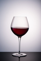 red wine in a wine glass on the background3
