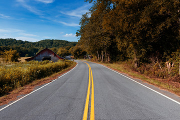 An old wood barn along a country road in rural Tennessee, USA