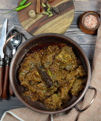 Overhead view of Indian  Goat curry, Mutton curry, Nihari, Rogan Josh in a bowl .