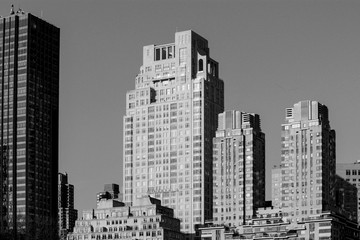 black and white photo of vintage skyscrapers along 15 central park avenue in New York, NY, United States - 302317554