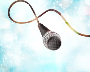 Retro style microphone on  background