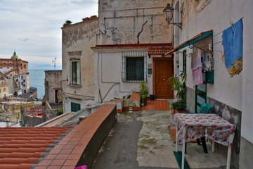 Obraz premium Atrani coast, Italy, 12/12/2017. The narrow street among the old houses of a coastal village