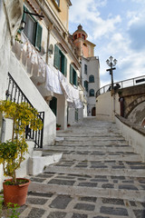 Fototapeta premium Atrani, Italy, 12/12/2017. The narrow street among the old houses of a coastal village