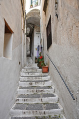 Naklejka premium Atrani, Italy, 12/12/2017. The narrow street among the old houses of a coastal village