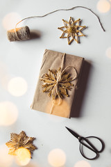 Kraft paper gift box Christmas rope isolated on white background. Top view.