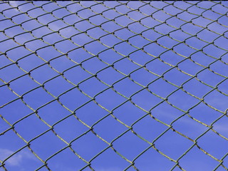 metal mesh against the sky