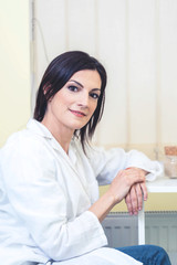 Portrait of an  female doctor in white coat