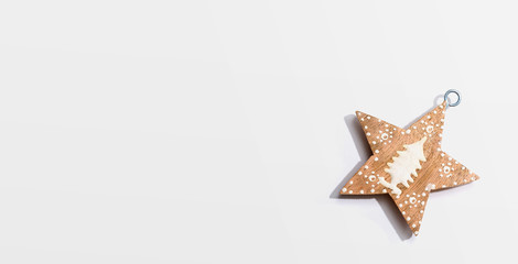 Christmas wooden star ornament from above - flat lay