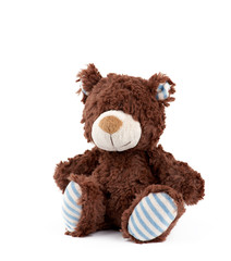 little fluffy brown bear on a white background