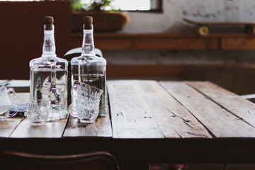 glass vase bottle on wooden table in dining room decoration vintage design aged style interior nature light have copy space