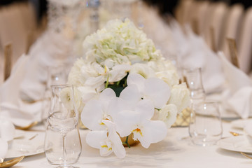 Banquet hall. Beautiful restaurant. Laid table. Table setting. Restaurant interior. Preparing to feast