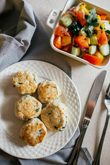 Chicken or turkey cutlets with vegetable salad from above. Healthy home food for diet.