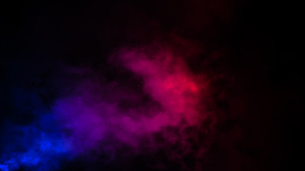 Abstract multi color fog smoke effects on isolated black background.