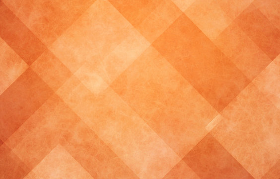 orange autumn background, halloween and Thanksgiving color, abstract background with angled lines, blocks, squares, diamonds, rectangles and triangle shapes layered in checkered style abstract pattern