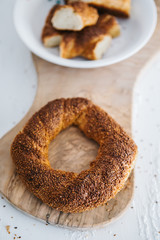Turkish fast food bagel called Simit.  Turkish bagel Simit with sesame. Bagel is traditional Turkish bakery food.