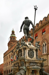 Fototapeta na wymiar Fountain Neptune and Palazzo Accursio in Bologna. Italy