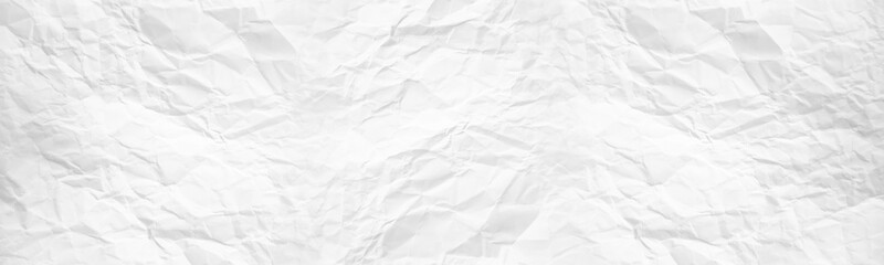 wide panorama crumpled paper texture background. crush paper so that it becomes creased and wrinkled.