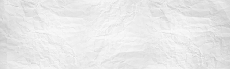wide panorama crumpled paper texture background. crush paper so that it becomes creased and wrinkled.