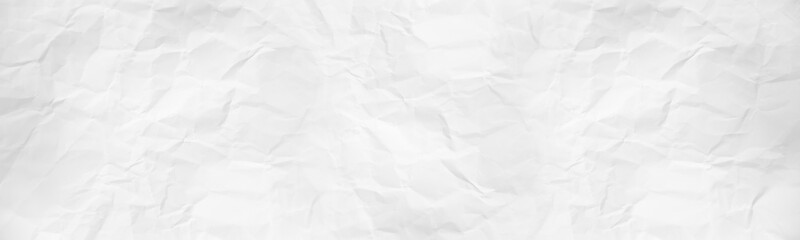 Obraz premium wide panorama crumpled paper texture background. crush paper so that it becomes creased and wrinkled.